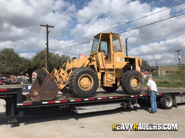Towing a CAT 930 wheel loader