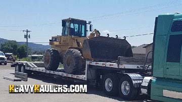 Loading a Caterpillar 936F wheel loader.