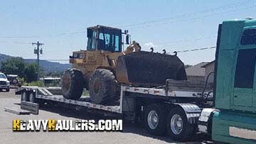  Loading a Caterpillar 936F wheel loader.