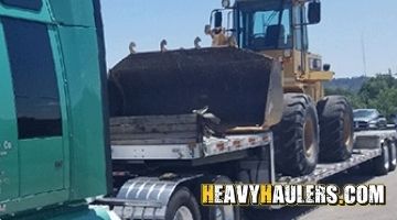 Hauling a Caterpillar wheel loader from Wyoming.