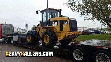 Transporting a Caterpillar 930G wheel loader.