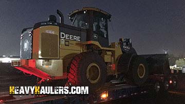 Transporting a John Deere 644K wheel loader.
