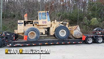 Moving a John Deere 744K wheel loader.