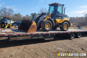 John Deere 324k wheel loader haul.