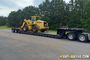 Hauling a 1990 Case 621 wheel loader.