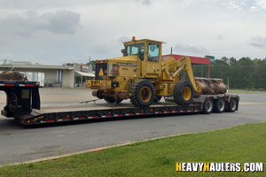 Transporting a 1990 Case 621 wheel loader.