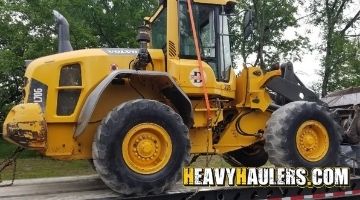 Hauling a Volvo wheel loader.