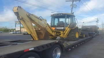 Shipping a New Holland backhoe.