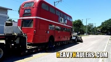 Super load transport of a double decker bus.