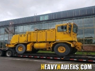Transporting an oversize snow trencher.